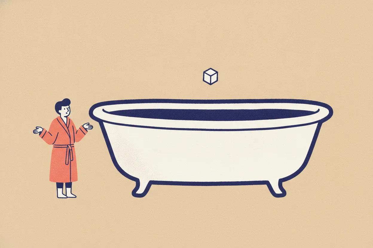 Stylised flat figure in a coral robe stands beside a large indigo bathtub with a single white salt crystal cube hovering above the water